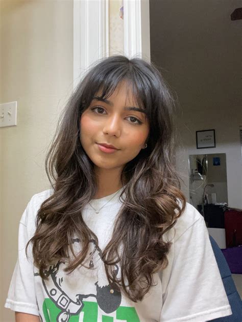 Bouncy Blowout With Curtain Bangs In Brown Hair Indian Skin