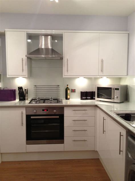 My beautiful white high gloss kitchen with glass worktop & glass splash back. | White kitchen ...