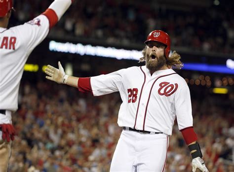 Washington Nationals' Jayson Werth celebrates scoring on a single by ...