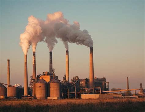 Industrial Landscape With Smokestack And Smoking Chimneys Premium AI