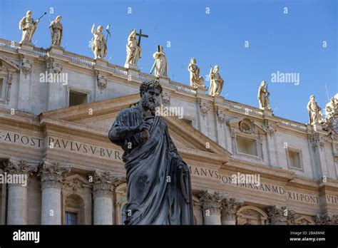 Statue Of St Peter In Front Of The Basilica In Vatican City And Other