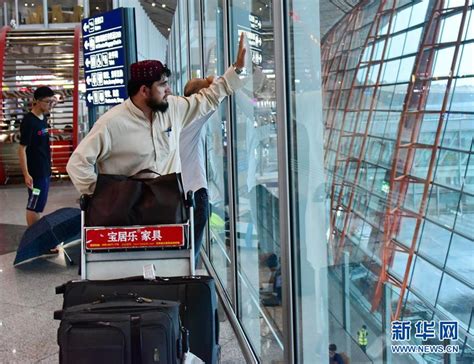 北京遭遇强降雨 首都机场部分航班延误或取消 组图 图片中国中国网