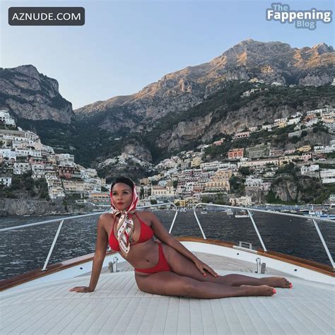 Janelle Monae Sexy Shows Off Her Sultry Body Wearing A Spicy Red Bikini At A Beach In Italy AZNude