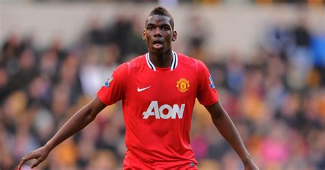 Paul Pogba playing for Manchester United against Wolves. Old Trafford ...