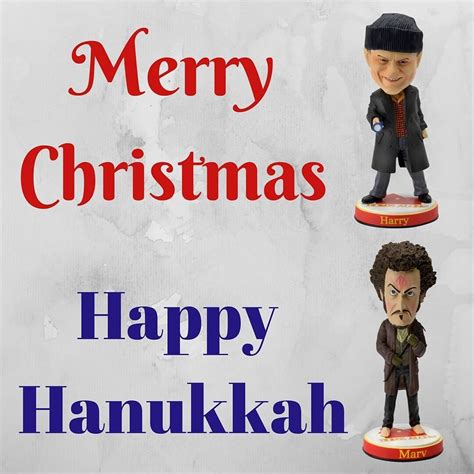 Two Bobble Heads On Top Of Each Other With The Words Merry Christmas Happy Hanukkah