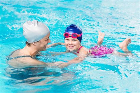 Smiling Little Girl, Learning Swimming Stock Photo - Image of ...