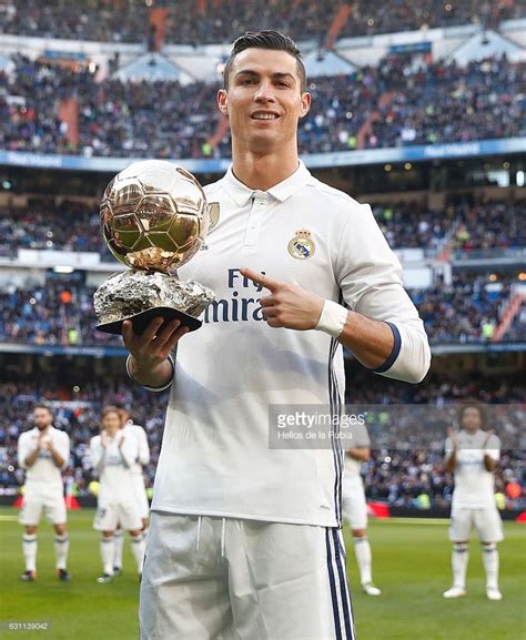 Cristiano Ronaldo of Real Madrid CF shows his fourth Golden Ball to the ...