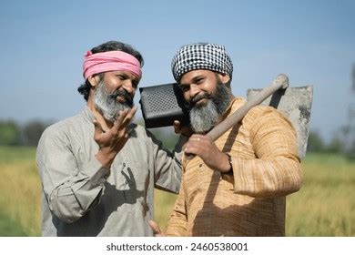 farmer listening radio royalty  images stock  pictures