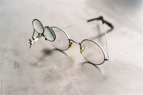 "Glasses With Magnifying Glass" by Stocksy Contributor "Koganami Studio ...