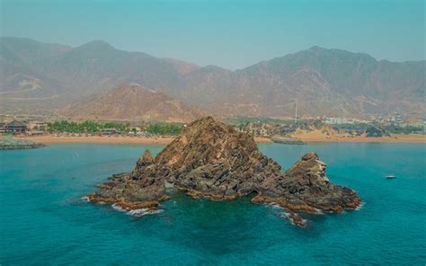 Places to Visit in Khorfakkan: Snoopy Island, Wadi Sena & More - MyBayut