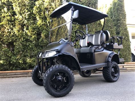 Black Lifted EZGO RXV 2+2 Golf Cart - Big Thunder Golf Carts