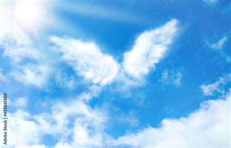 Silhouette Of Angel S Wings Made Of Clouds In Blue Sky Stock Photo