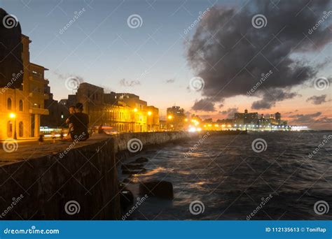 Sunset at Malecon, the Famous Havana Promenades. Cuba. at the Bo ...