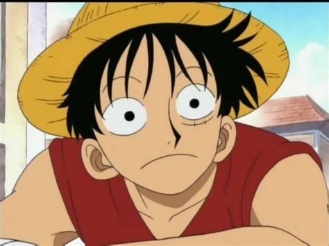 An Anime Character Wearing A Straw Hat And Looking At The Camera With