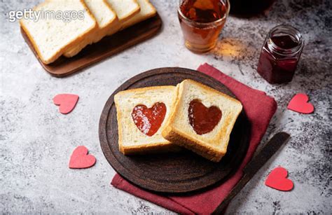 Sweet Sandwiches With Strawberry Jam With Heart Shape Inside For