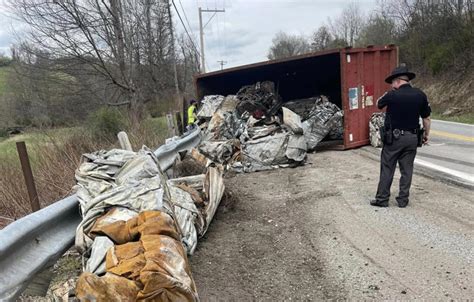 Truck Hauling Scrap Metal Overturns Near Hodgesville Driver Hospitalized