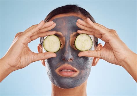 Premium Photo Face Mask Skincare And Woman With Cucumber On Eyes For