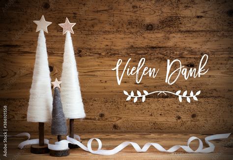 Christmas Decoration Like White Tree With Star On Wooden Background