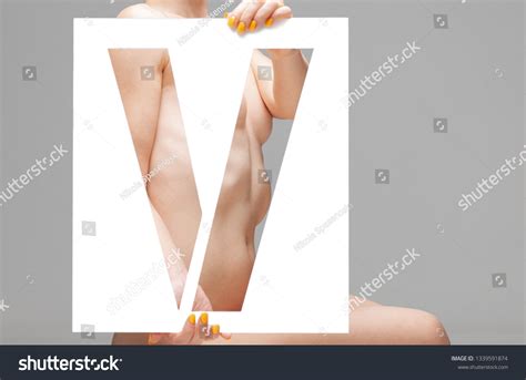 Nude Female Body Behind Stencil Letter Stock Photo 1339591874 Shutterstock