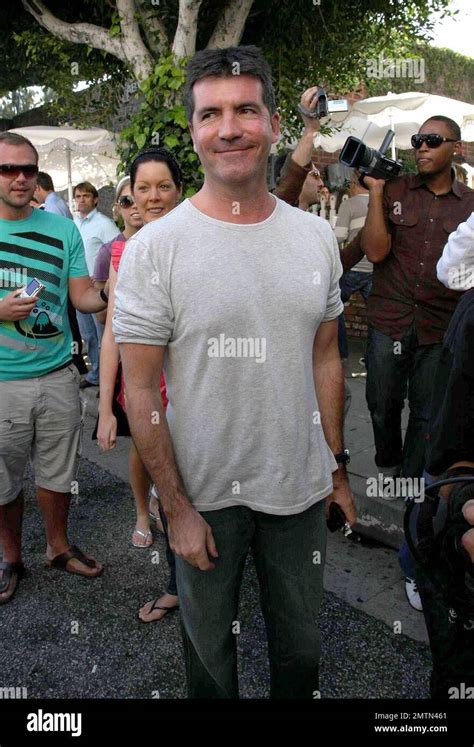 Simon Cowell is an American Idol. His fans crowded around him today as he lunched at The Ivy ...