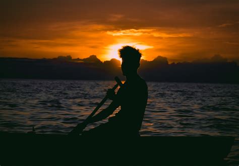 A Silhouette of Man Holding a Camera · Free Stock Photo