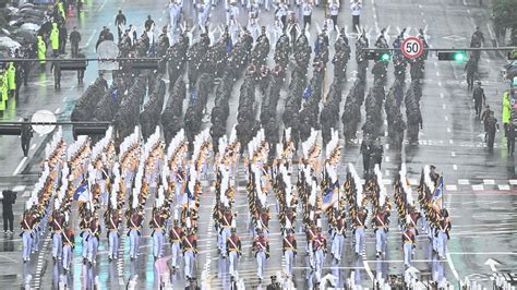 South Korea flexes military muscle with parade, issues dire warning ...