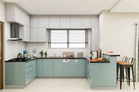 Spacious Kitchen Design With Breakfast Counter And Pale Blue Cabinets Livspace