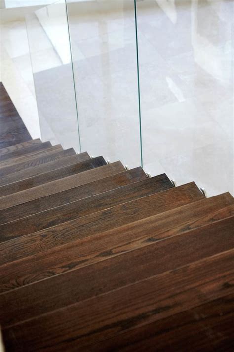 Floating Zigzag Staircase With Frameless Glass Railings Modern