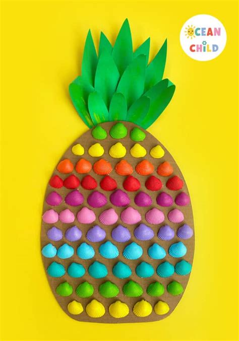 Shell craft for summer, DIY rainbow-colored pineapple - Ocean Child Crafts