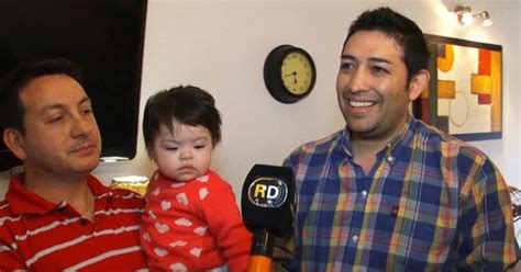 Argentine Un Couple Gay Adopte Un B B S Ropositif Rejet Par Dix Familles Marie Claire
