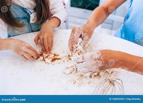 Mother With Her Daughter Are Cooking In The Kitchen Lifestyle Hands