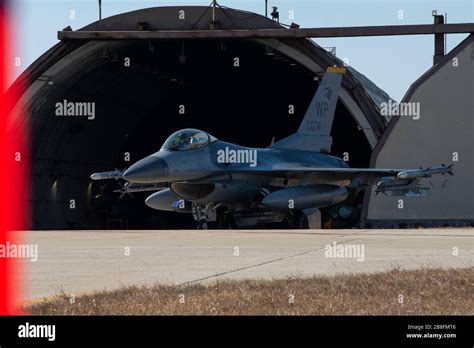 A U S Air Force F 16 Fighting Falcon Aircraft Assigned To The 80th Fighter Squadron Awaits A