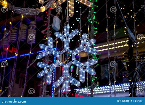 Christmas and Party Lights in the Shape of Snowflake Stock Photo ...