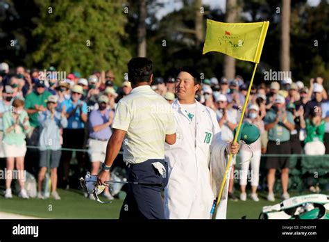 Hideki Matsuyama Greets His Caddie Shota Hayafuji After Matsuyama Won