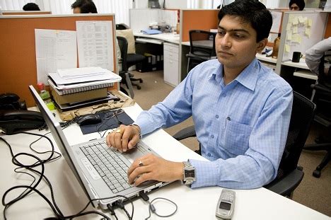 Indian Software Engineers At Work At Programming Call Center