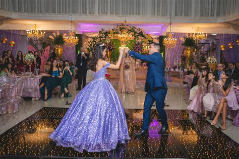 Quinceañera Dancing With Her Father At Her Birthday Party · Free Stock