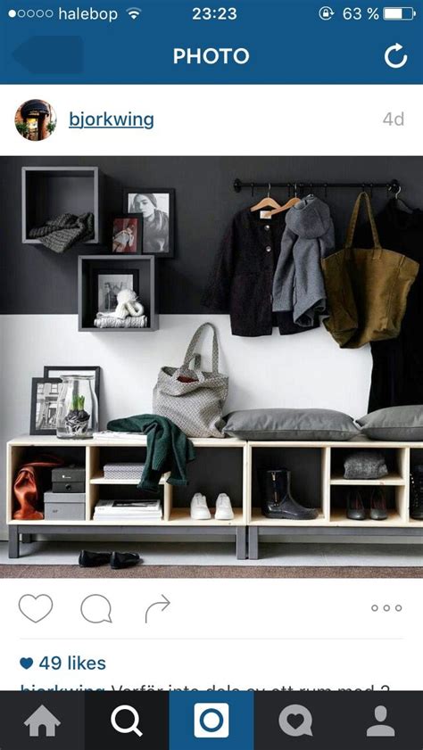 An Image Of A Room With Clothes And Shoes On The Shelf In Front Of It