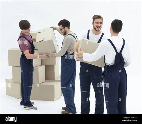 Delivery Men With Cardboard Boxes On White Background Stock Photo Alamy