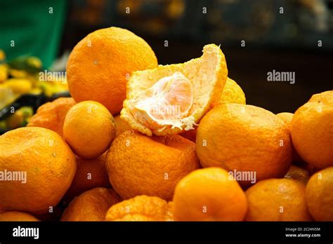 Whole And Peeled Mandarin Oranges Stock Photo Alamy