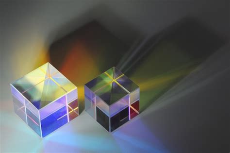 Premium Photo Two Glass Prism Cubes Closeup Refract Light And Cast