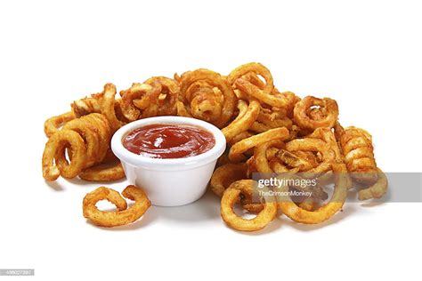 Seasoned Curly Fries High-Res Stock Photo - Getty Images