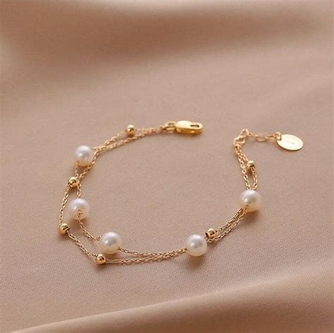 Material This Bracelet Is Made Of Natural Pearls And K Gold Planted