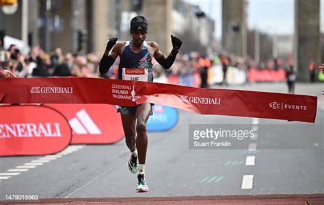 Sabastian Sawe of Kenya crosses the finishing line as he wins the