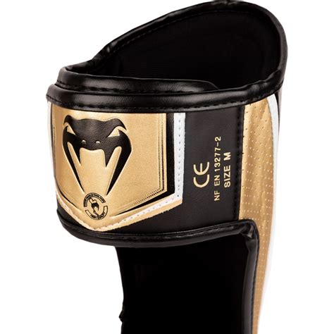 ММА шингарды Venum Elite Evo White/Gold купить в Москве