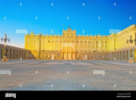 Royal Palace In Madrid Palacio Real De Madrid And Armory Square In The Evening Time Spain