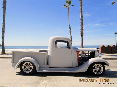 AUGUST IN STYLE AND FUN HOW A HOT ROD CHEVY TRUCK GETS ITS OWNERS DOWN THE ROAD OF