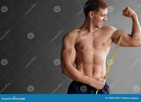 Bodybuilder Measuring Muscle Stock Photo Image Of Macho Muscular