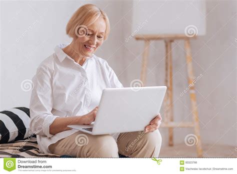 Positive Delighted Mature Woman Working With Laptop Stock Photo Image