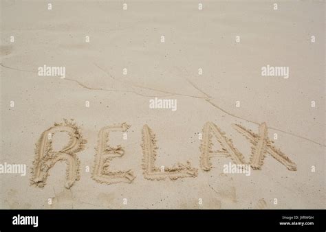 Word Relax on beach - vacation concept background Stock Photo - Alamy