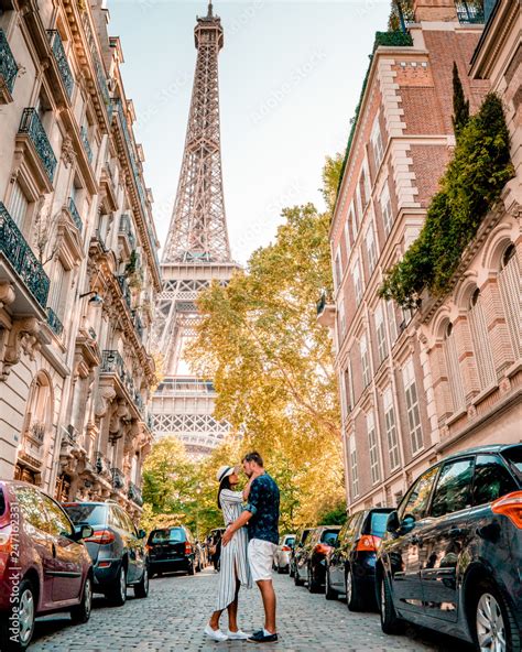 Street View With Eiffel Tower In The Midle During Summer Time In Paris